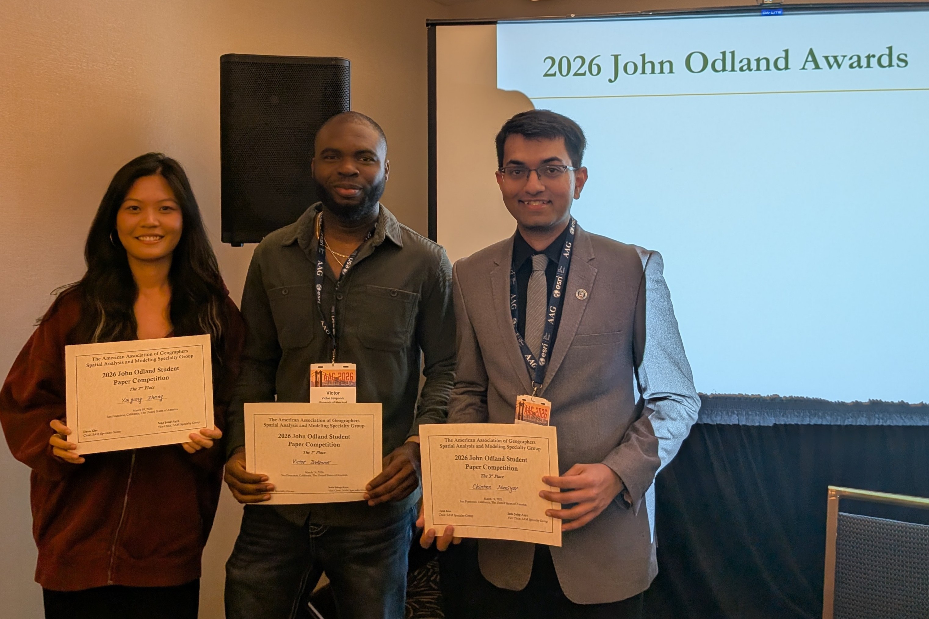 An image of the John Odland Paper Competition Winners from left to right: Xinyang Zhang, Victor Irekponor, & Chintan B. Maniyar.